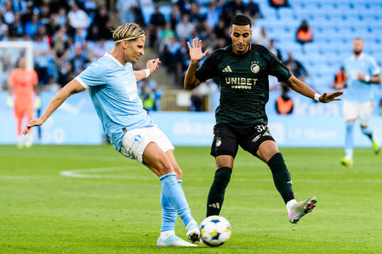 Jens Stryger Larsen of Malmö FF and Elias Achouri  of FC
