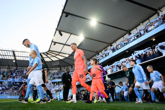 Pontus Jansson and goalkeeper Robin Olsen of Malmö FF