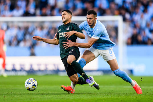 Mohamed Elyounoussi of FC Copenhagen and Andrej Djuric of