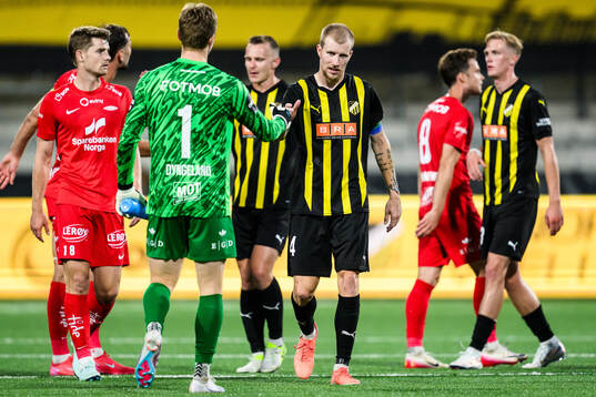 Goalkeeper Mathias Dyngeland of Brann and Simon Gustafson