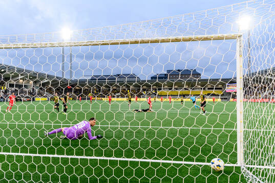 Saevar Atli Magnusson of Brann scores 0-2 behind goalkeeper