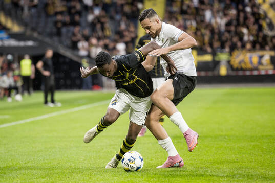Abdihakim Ali of AIK and Nadhir Benbouali of Györi ETO