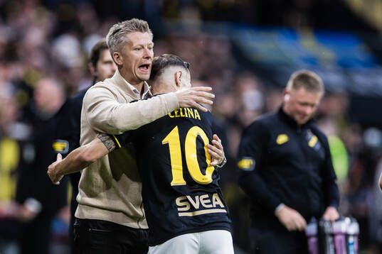 Coach Mikkjal Thomassen and Bersant Celina celebrates