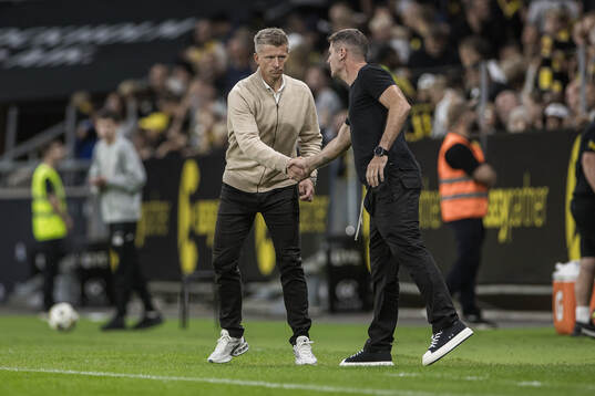 Coach Mikkjal Thomassen of AIK and coach Balazs Borbely of
