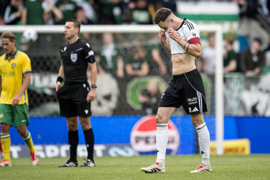 Ole Selnæs of Rosenborg looks dejected