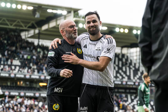 Naprapate Magnus Svärd of Hammarby and Dino Islamovic of