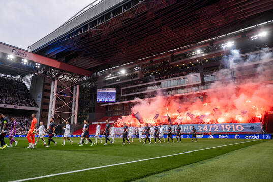 Players of Malmö FF and of FC Copenhagen enter the pitch