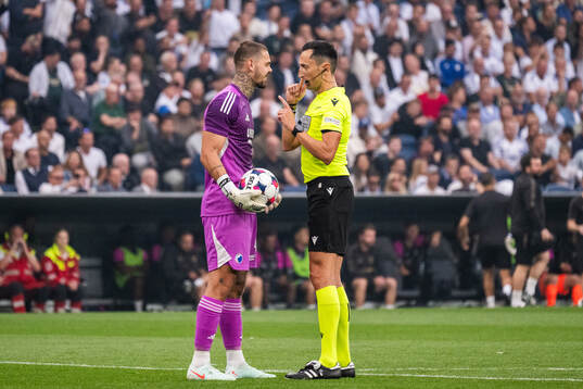 goalkeeper Dominik Kotarski of FC Copenhagen and referee