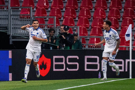 Mohamed Elyounoussi and Robert of FC Copenhagen celebrate