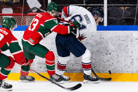 Frölundas Nicklas Lasu och HV71s Axel Rindell