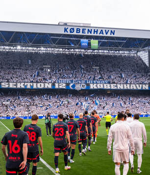 Players of Malmö FF and of FC Copenhagen enter the pitch