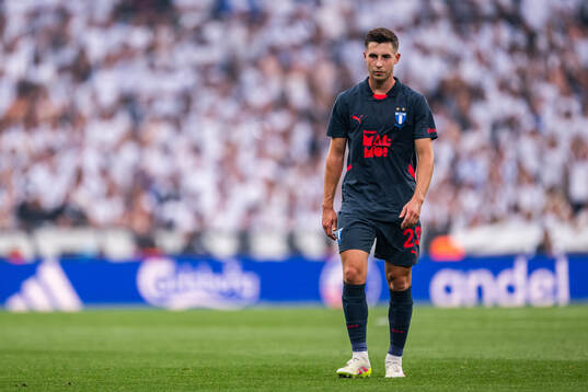 Lasse Berg Johnsen of Malmö FF looks dejected
