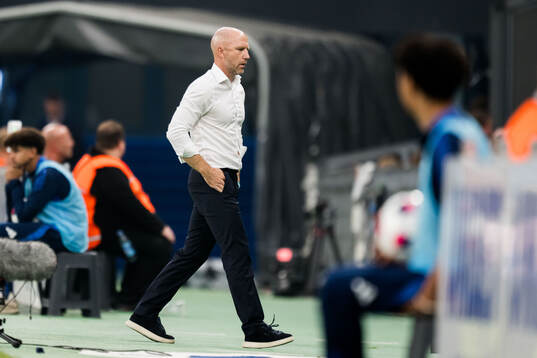 Head coach Henrik Rydström of Malmö FF looks dejected