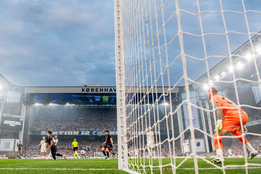 Robert of FC Copenhagen scores the 5-0 goal against Colin