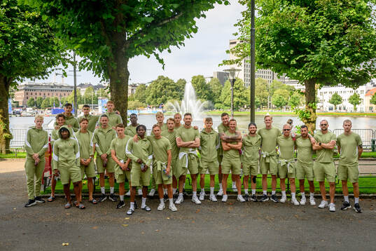 The players pose for a photo