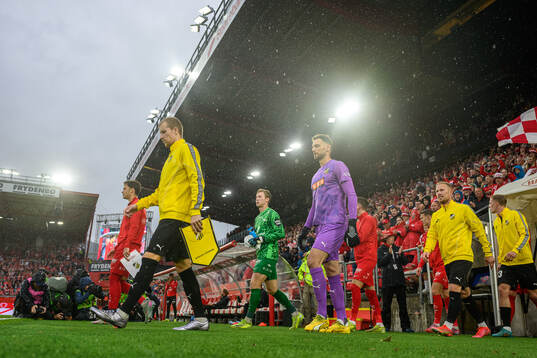 Simon Gustafson, goalkeeper Etrit Berisha and Mikkel