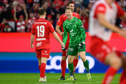Goalkeeper Mathias Dyngeland of Brann celebrates