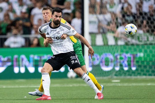 Frederik Winther of Hammarby and Dino Islamovic of Rosenborg