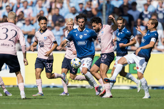 Halmstads Rocco Ascone och Joel Allansson mot Malmö FFs