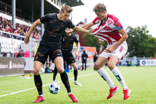Emil Kornvig of Brann and Jens Hjertø-Dahl of Tromsø