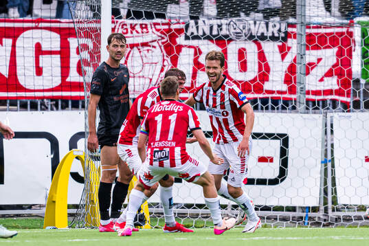 Vegard Erlien of Tromsø celebrates