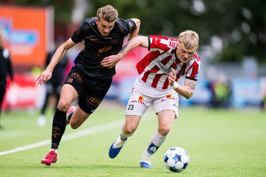 Emil Kornvig of Brann and Runar Norheim of Tromsø