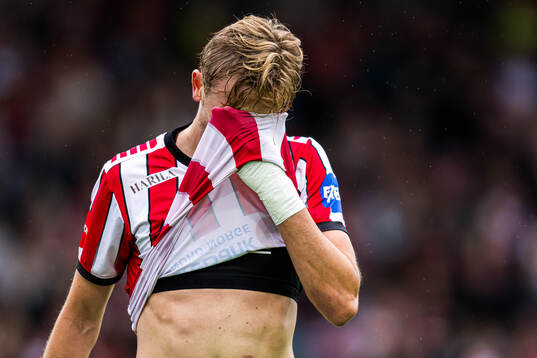 Vetle Skjærvik of Tromsø looks dejected