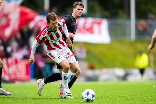 Vegard Erlien of Tromsø and Jacob Ebsen Sørensen of Brann