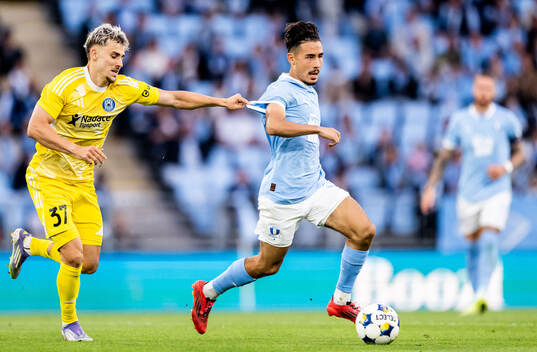 Stepan Langer of SK Sigma Olomouc and Adrian Skogmar of