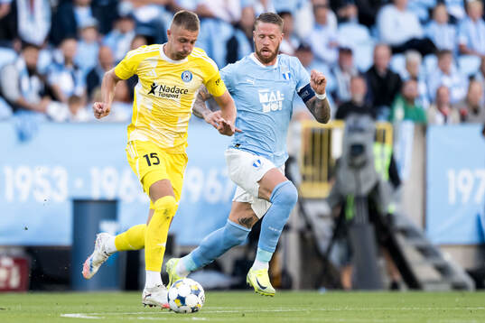 Daniel Vasulin of SK Sigma Olomouc and Pontus Jansson of