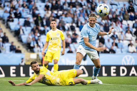 Jan Navratil of SK Sigma Olomouc and Jens Stryger Larsen of