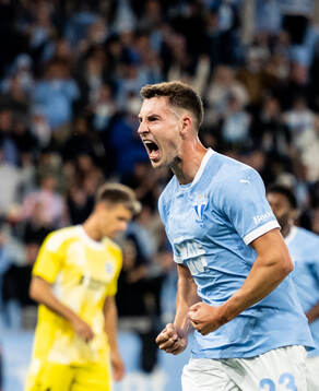 Lasse Berg Johnsen of Malmö FF celebrates his 3-0 goal