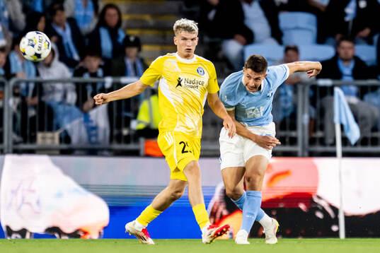 Matej Mikulenka of SK Sigma Olomouc and Lasse Berg Johnsen
