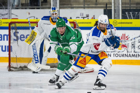 Rögles Fredrik Olofsson och Zugs Dominik Schlumpf