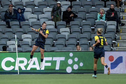 Viktoriya Hiryn of Metalist 1925 celebrates