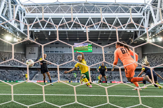 Ellen Wangerheim of Hammarby scores 1-0 behind goalkeeper