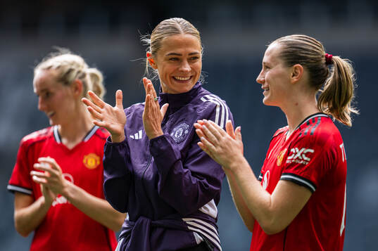 Fridolina Rolfö and Elisabeth Terland of Manchester United