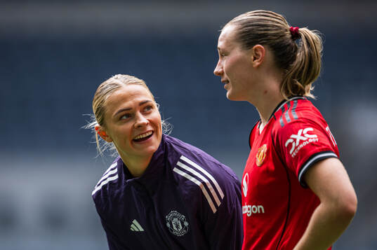 Fridolina Rolfo and Elisabeth Terland of Manchester United