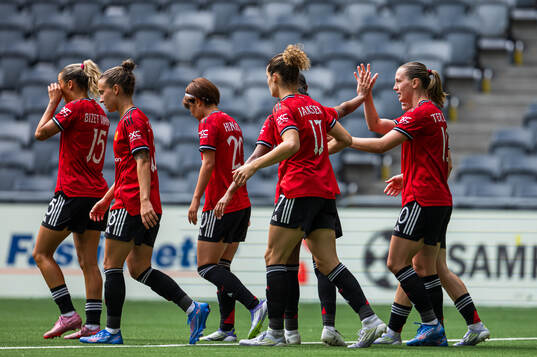 Elisabeth Terland of Manchester United celebrates with her