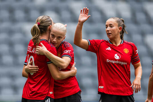 Elisabeth Terland and Anna Sandberg of Manchester United