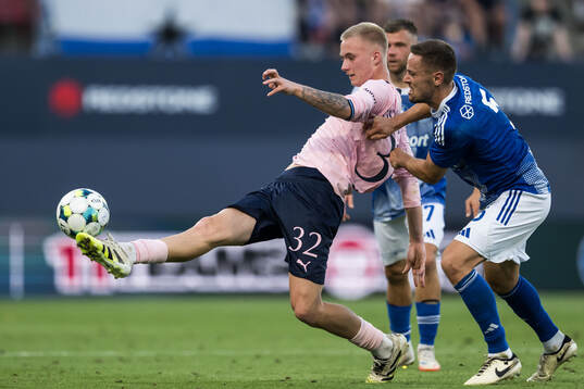 Daniel Gudjohnsen of Malmö FF and Tomas Huk of SK Sigma