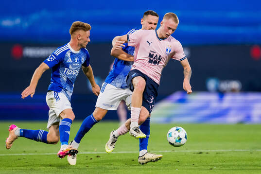 Daniel Gudjohnsen of Malmö FF and Tomas Huk of SK Sigma