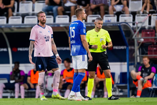 Pontus Jansson of Malmö FF and Referee Radu Petrescu