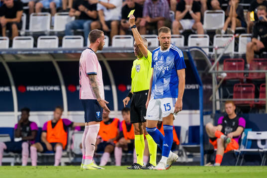 Pontus Jansson of Malmö FF and Referee Radu Petrescu