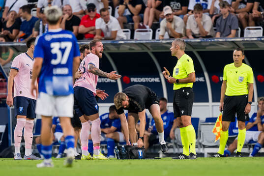 Pontus Jansson of Malmö FF and Referee Radu Petrescu