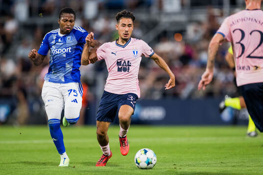 Simion Michez of SK Sigma Olomouc and Adrian Skogmar of