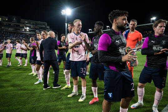 Daniel Gudjohnsen and Salifou Soumah of Malmö FF