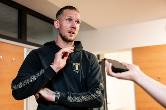 Goalkeeper Robin Olsen of Malmö FF is being interview