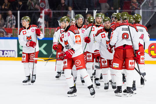 Players of Bolzano look dejected