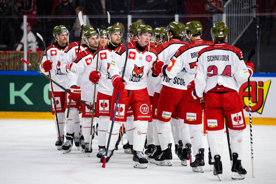 Players of Bolzano look dejected